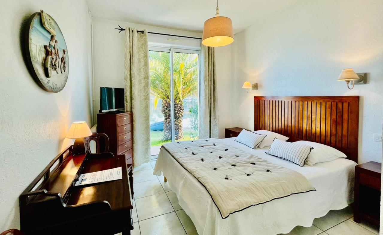 Hotel La Caravelle Logis Biscarrosse Exterior foto